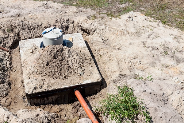 before septic tank pumping, it's important to clear the area around the tank and provide access for the pumping equipment